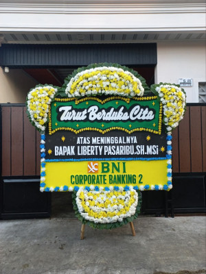 Papan Bunga Duka di Harian