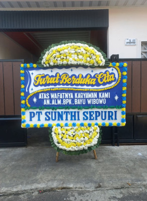 Papan Bunga Duka di Harian