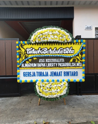 Papan Bunga Duka di Harian