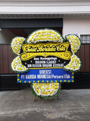 Papan Bunga Duka di Harian