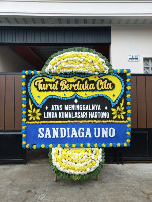 Papan Bunga Duka di Harian