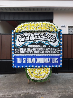 Papan Bunga Duka di Harian